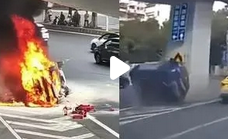 广州宝马变道与出租相撞起火 出租司机被控制_现代网新闻频道